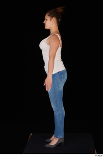 Serina Gomez blue jeans casual dressed grey high heels standing…